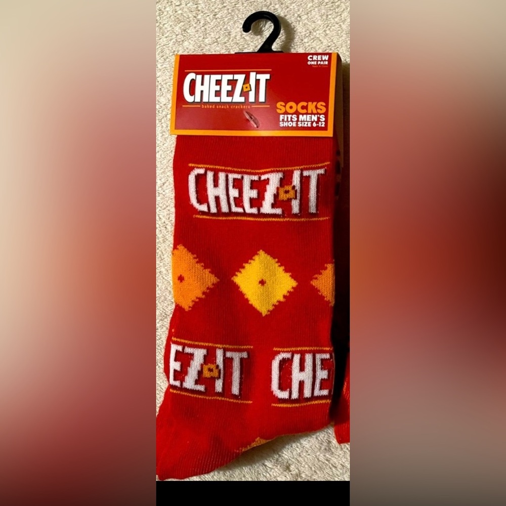Men’s / unisex novelty crew socks Cheez It. Fits shoe size 6-12.